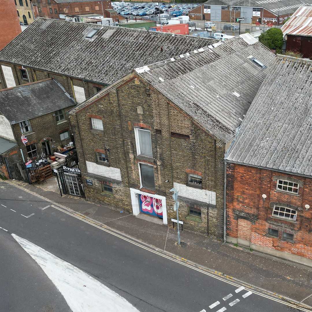 A photographer working with a client in our studio